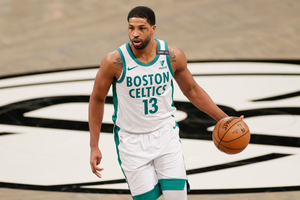 Tristan dribbling a basketball while playing for the Boston Celtics