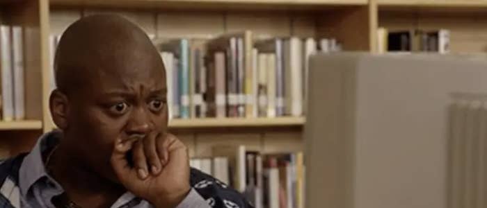 Titus from "The Unbreakable Kimmy Schmidt" looking at a computer shocked