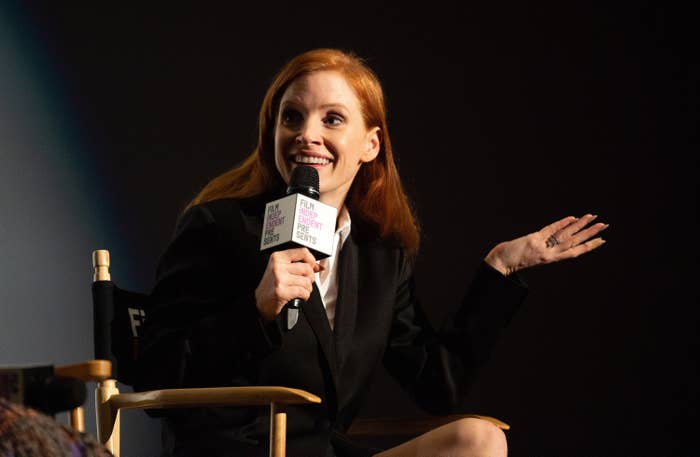 Jessica Chastain speaking onstage at a screening of The Eyes of Tammy Faye