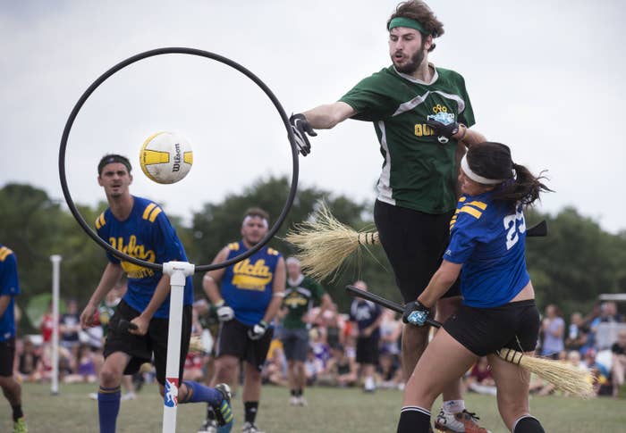 Two teams playing each other in a quidditch match