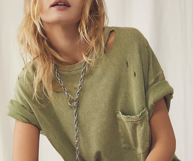 A distressed t-shirt with rips and holes