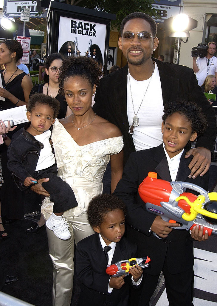 Will and Jada with their three kids on the men in black carpet