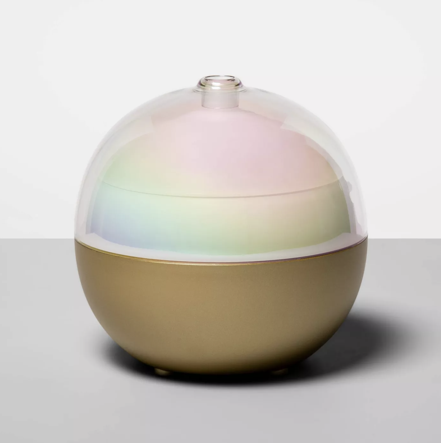 the color changing diffuser with gold base and rainbow insides