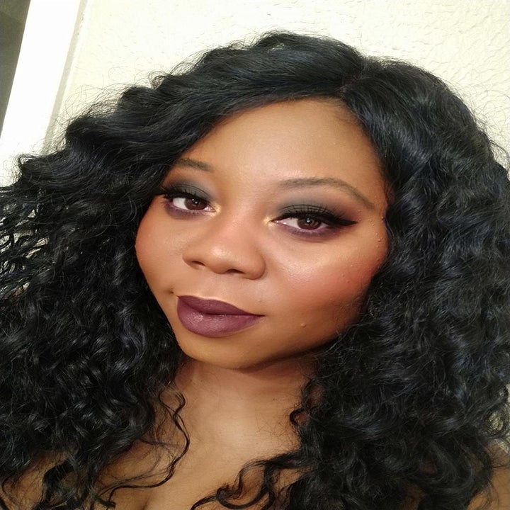 reviewer wearing the lipstick in shade originator