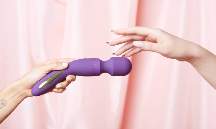 Models holding purple wand vibrator
