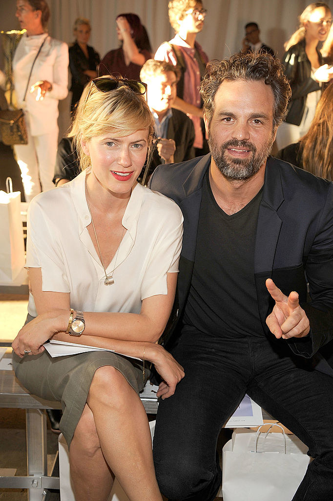 the couple at a fashion show front row