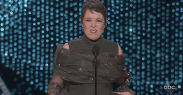 Olivia Colman making a farting face