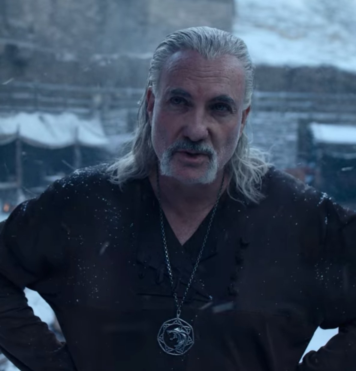 Kim Bodnia as Vesemir stands in the snow in &quot;The Witcher&quot;