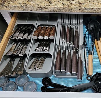 a reviewer shows three organizers in their drawer