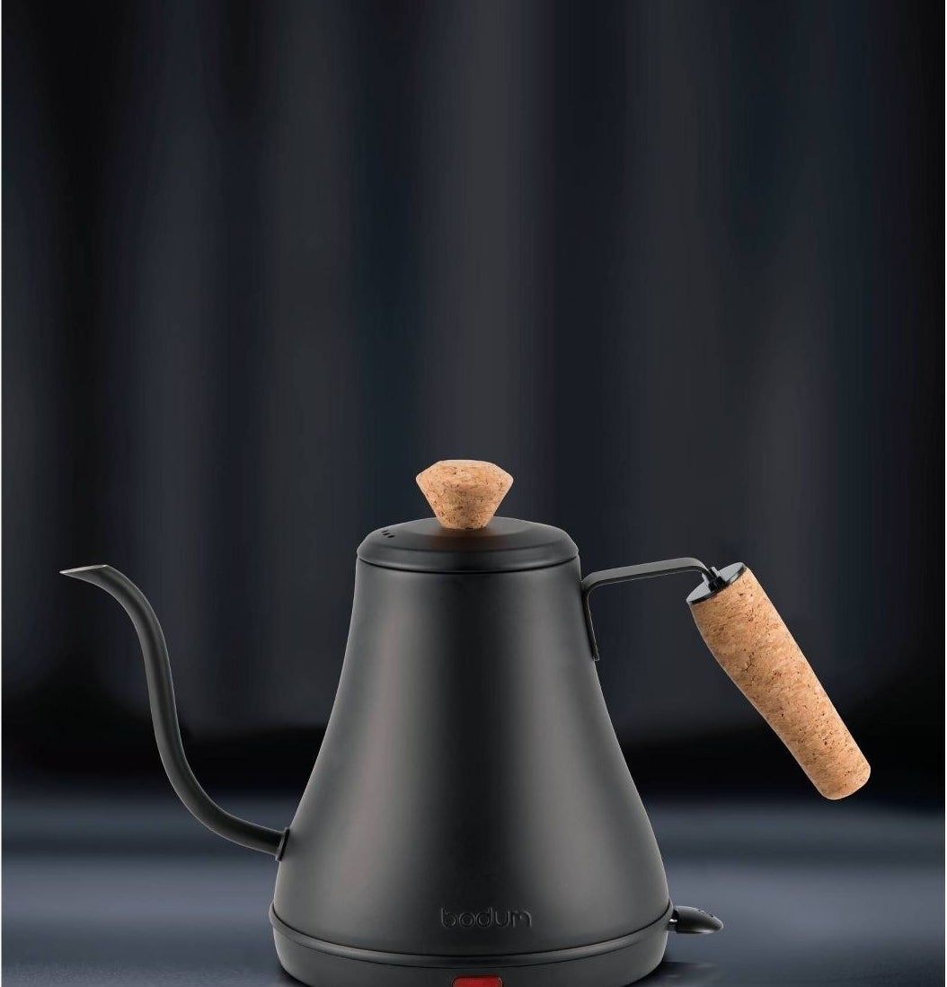 black gooseneck electric kettle with cork top and handle