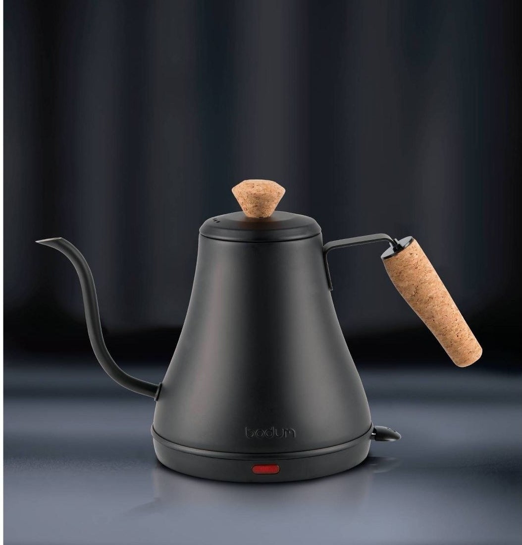 black gooseneck electric kettle with cork top and handle