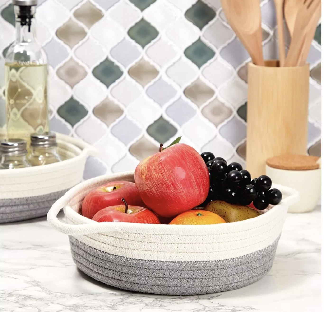 Small grey woven basket with fruit
