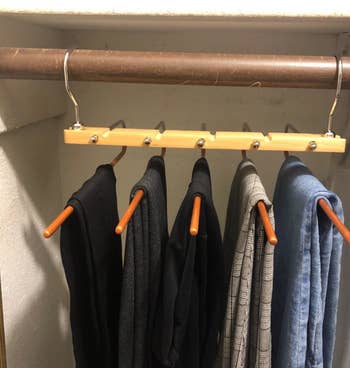 five pairs of a reviewers pants on the hanger
