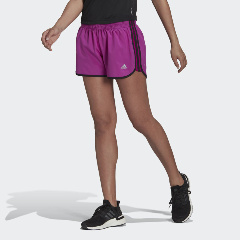 An image of a model wearing a pair of active shorts