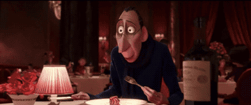 Anton Ego smiling for the first time in &quot;Ratatouille&quot; after trying Remy&#x27;s Ratatouille