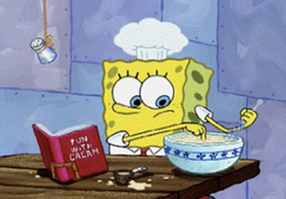SpongeBob following a recipe while cooking in the kitchen