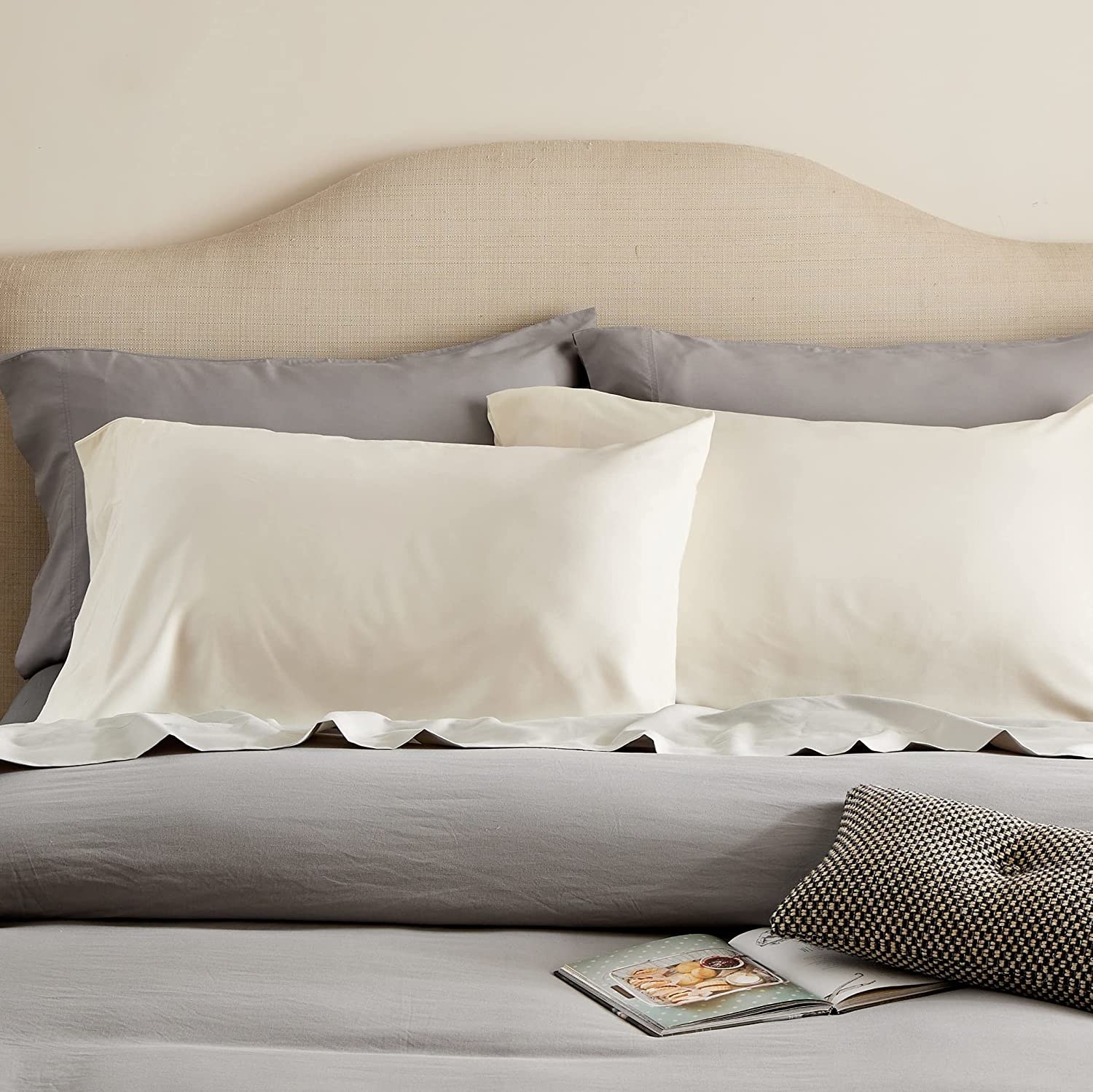 A set of pillows with the bamboo pillowcases on a bed
