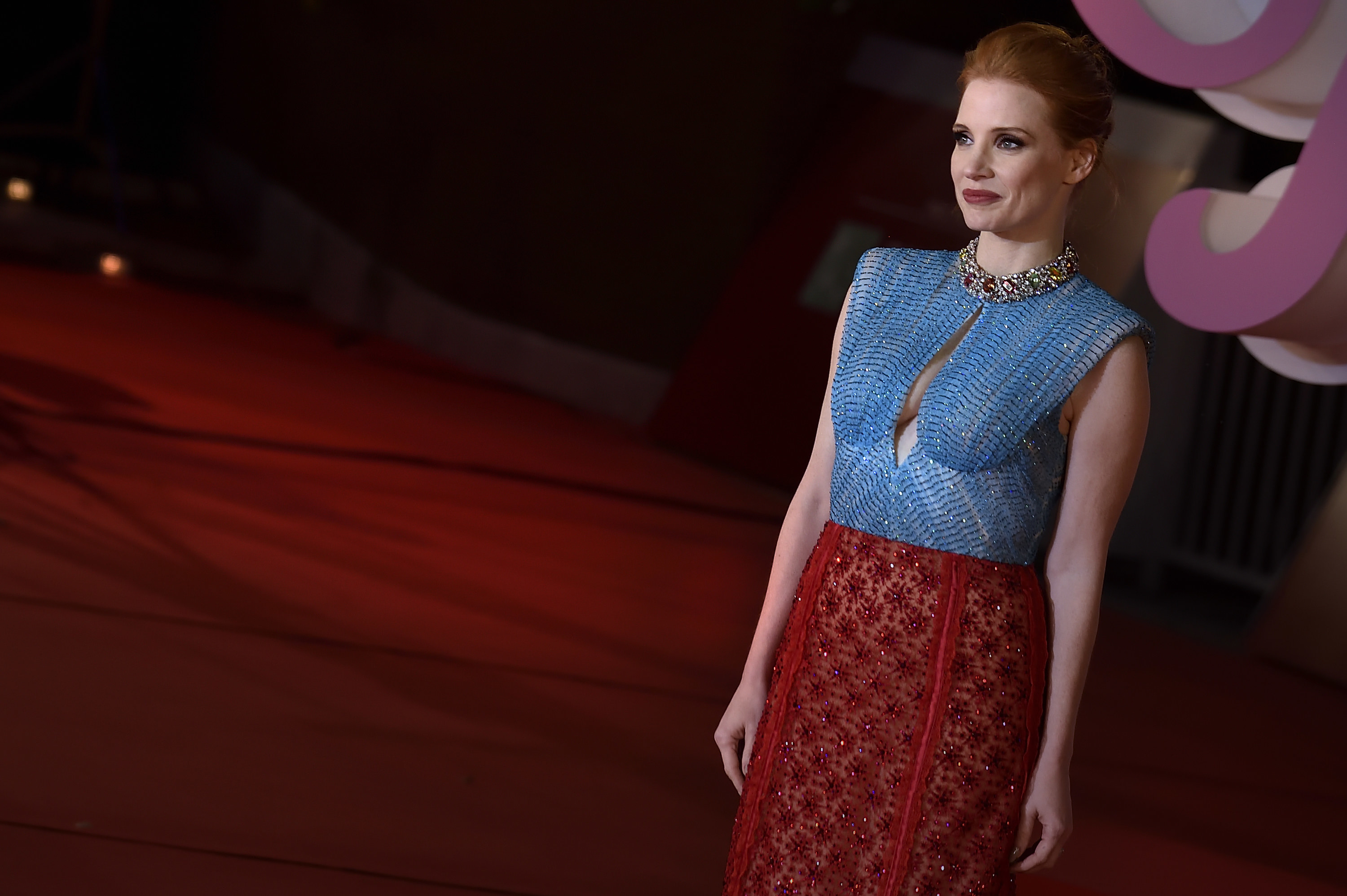 Jessica Chastain at Rome Film Fest in 2021 in a two-toned dress with a keyhole cutout