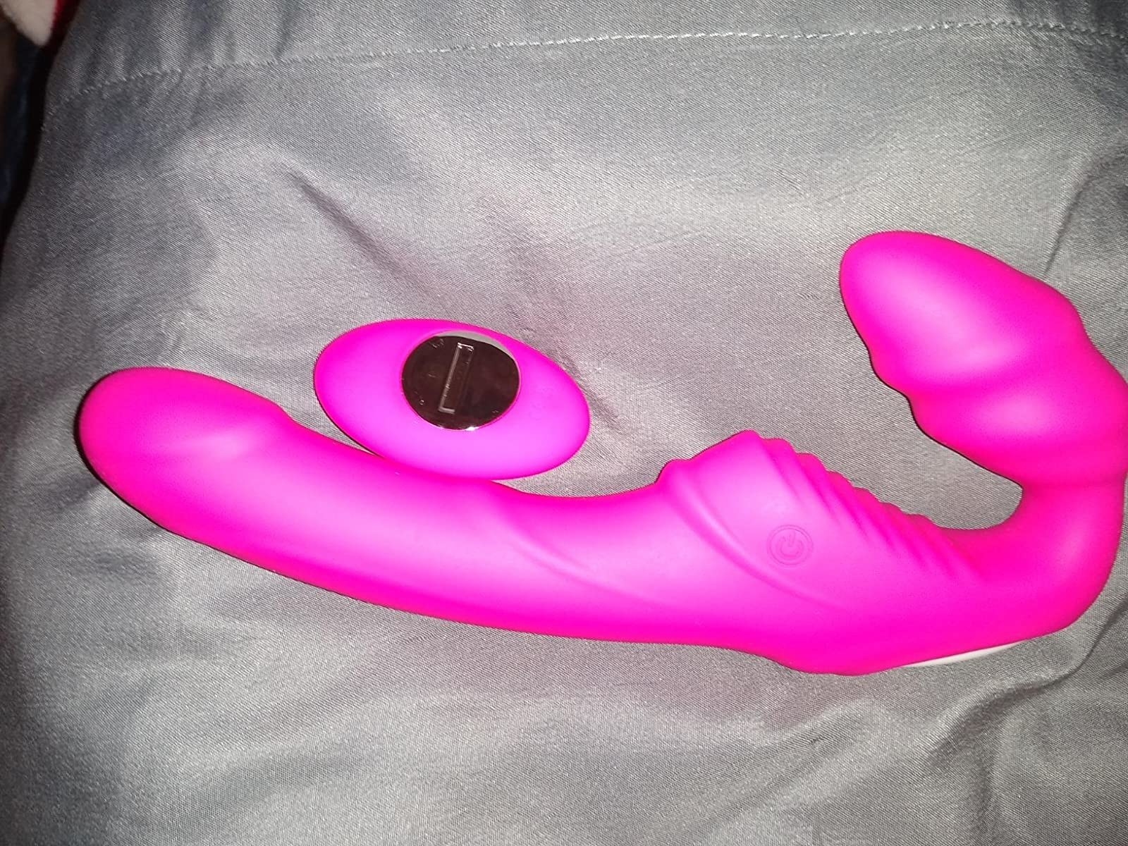 Pink dual-ended strap-on with wireless remote
