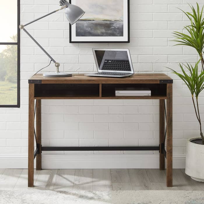 brown desk with two compartments