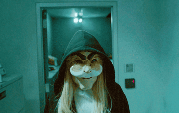 Angela with a mask on