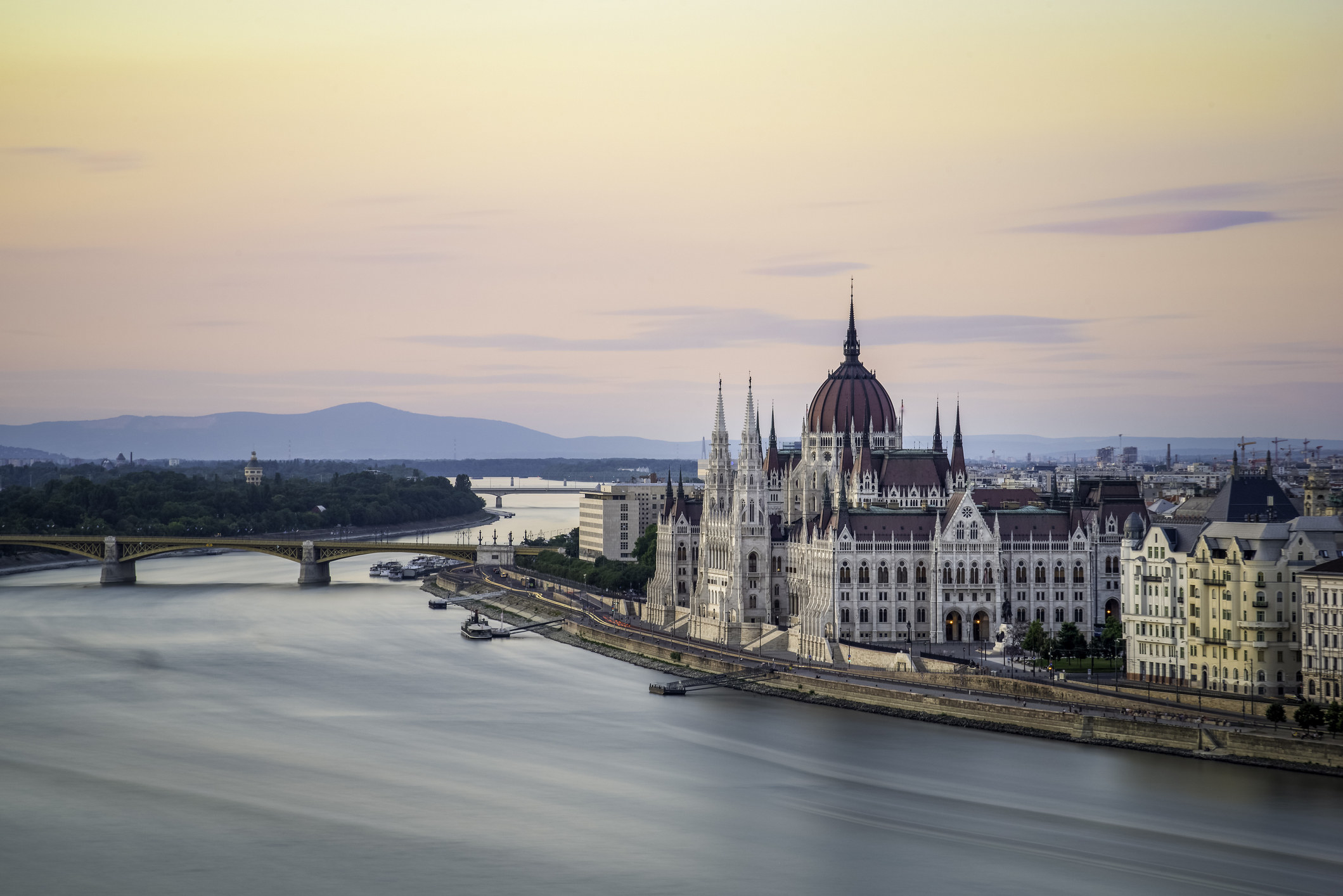 The Hungarian Parliament Building on the banks of the Danube at dawn.