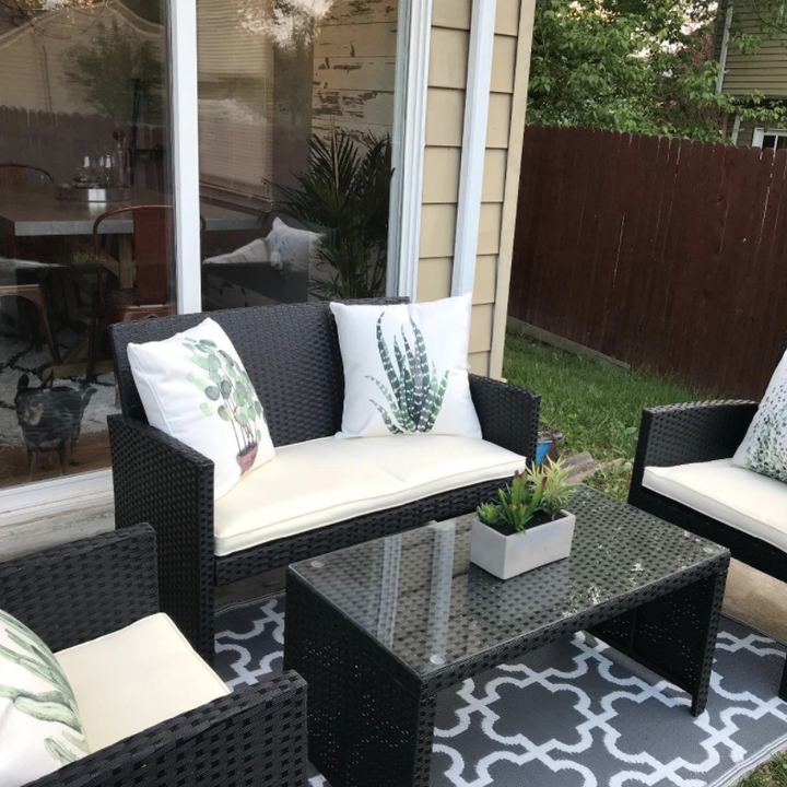 Reviewer uses the same decorative throw pillows on her patio sofa