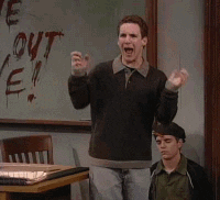 Corey running, grabbing his head, and screaming on