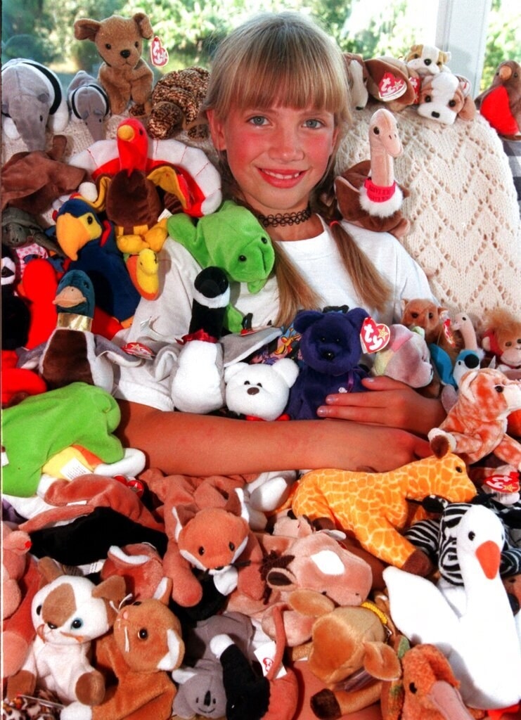 Anne Friedlande poses with some of her 123 Beanie Babies