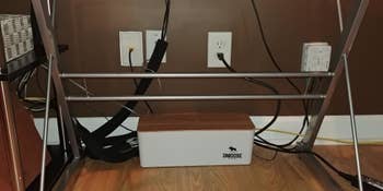 after photo of same reviewer, showing all the cords in the neat box