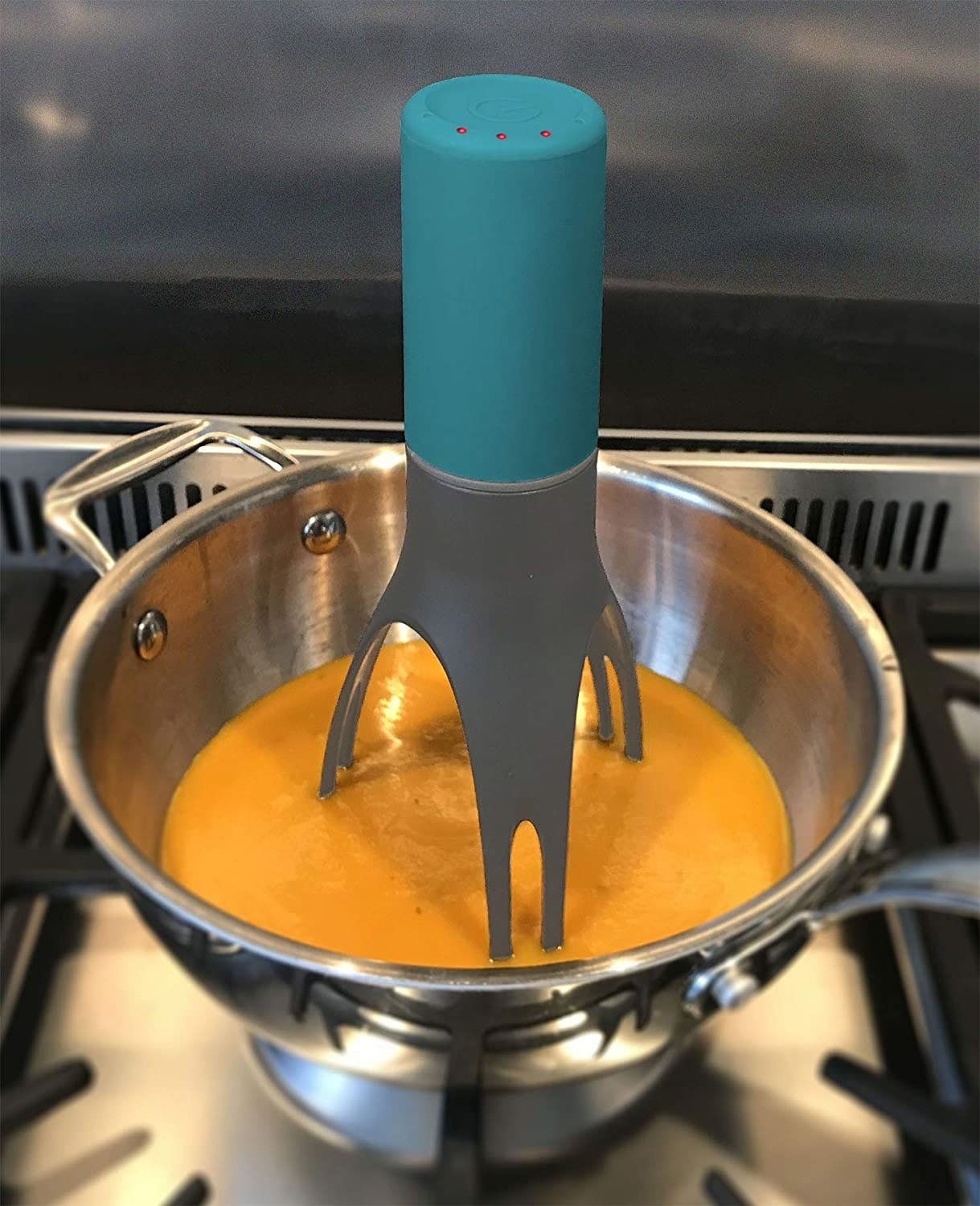 blue automatic stirrer in a pot
