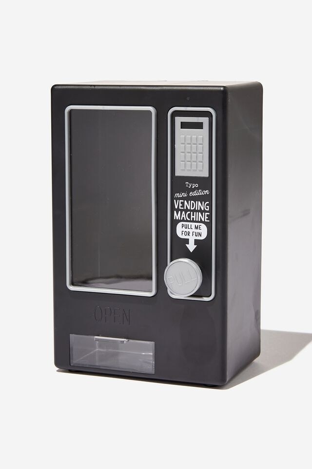 small black vending machine with a pull that releases whatever is inside into the tray