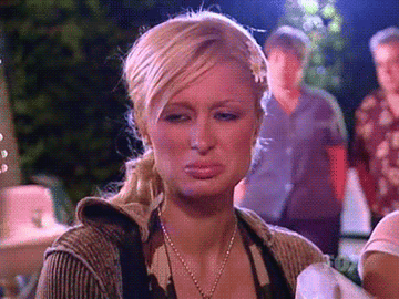Paris Hilton looking disgusted