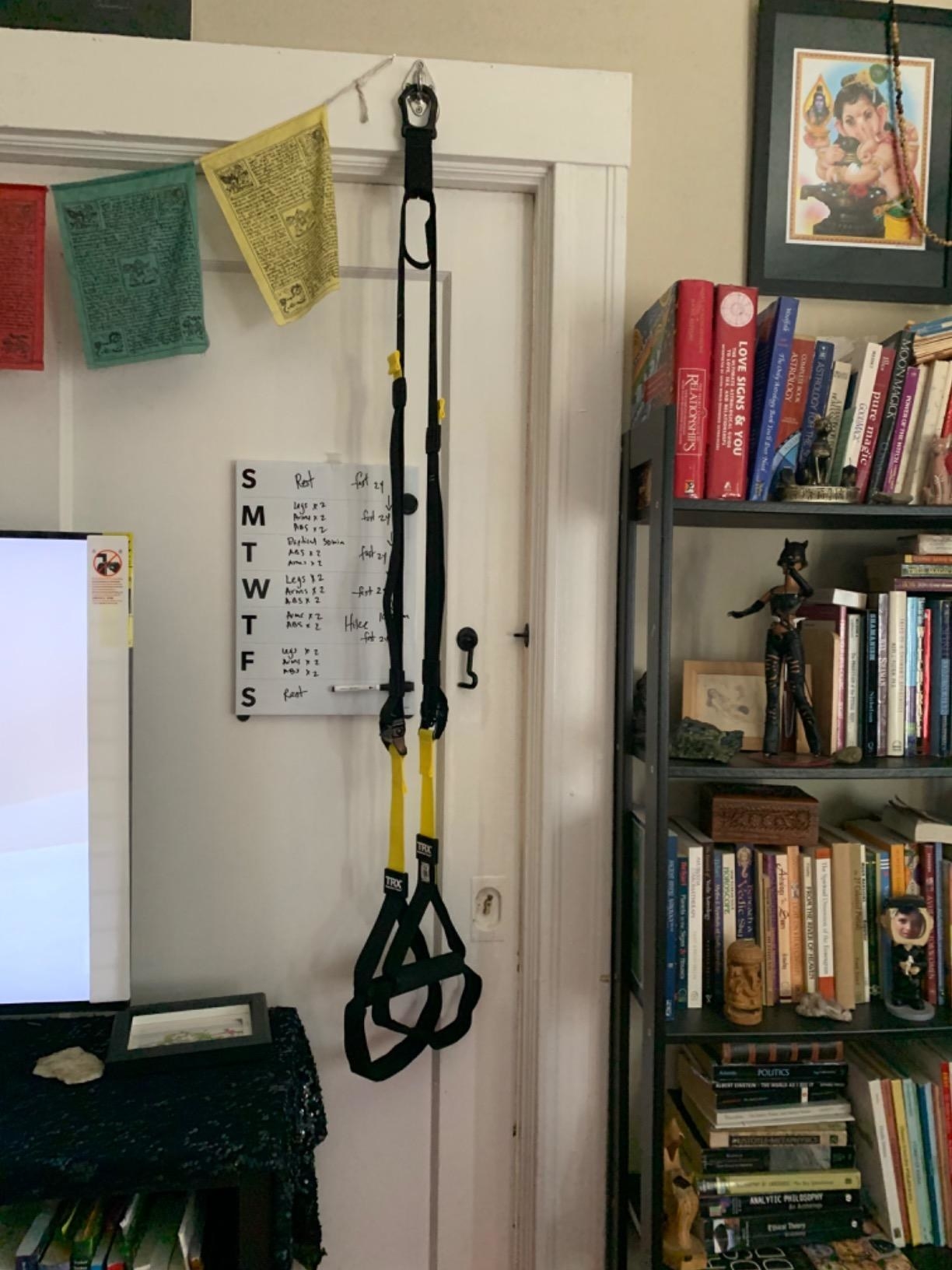 Reviewer photo of the TRX system on a door frame