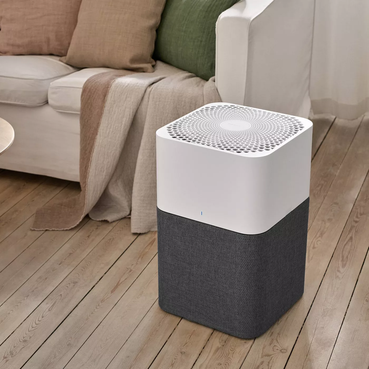 A white and grey air purifier