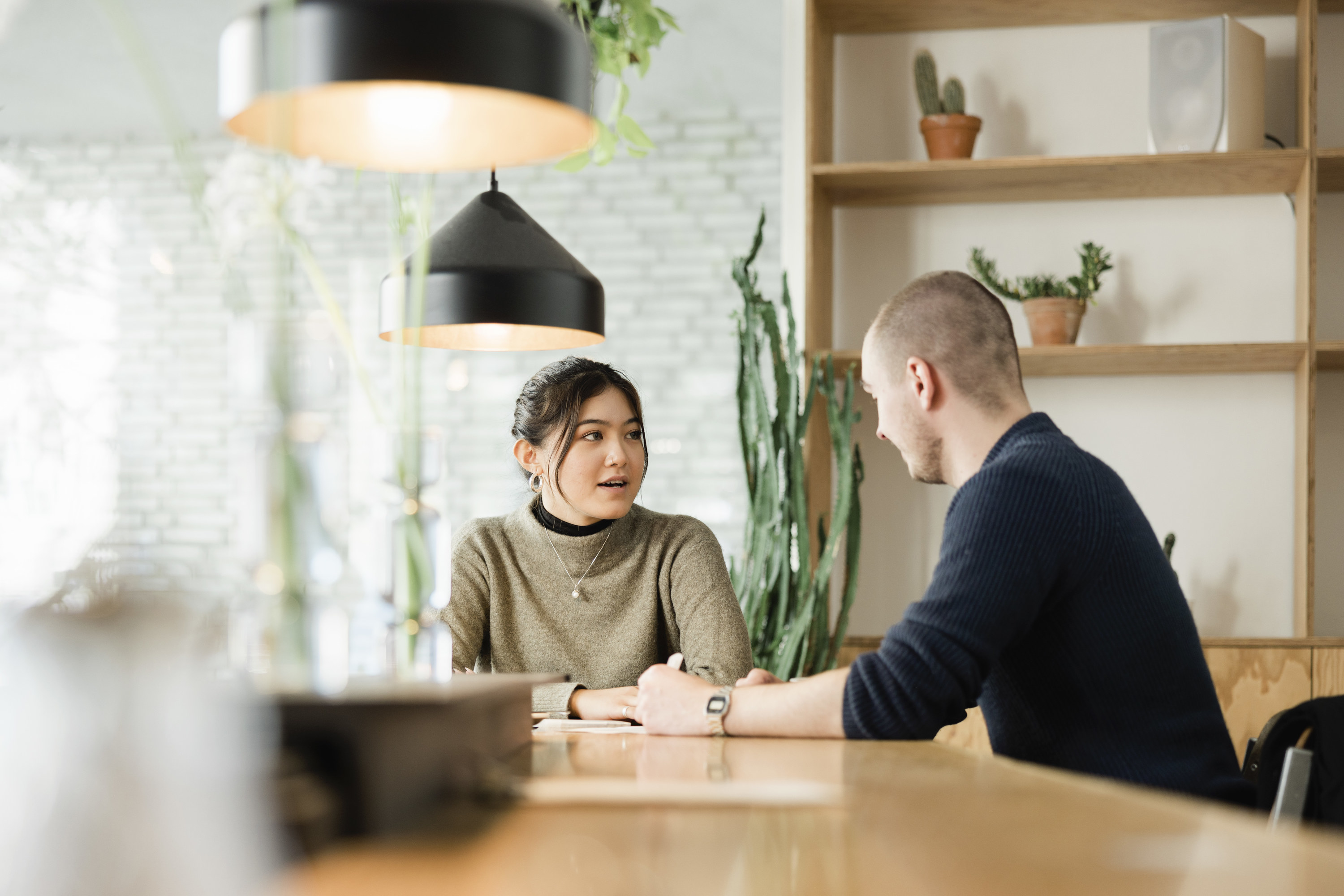 Coworkers meeting in an office