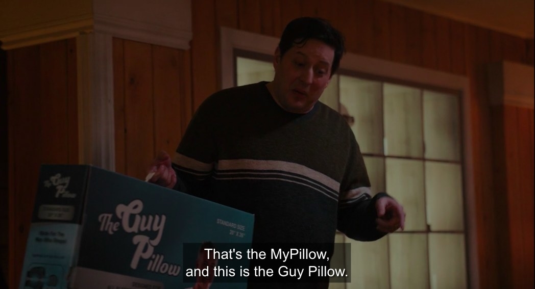 Sean shows off his pillow called the Guy pillow