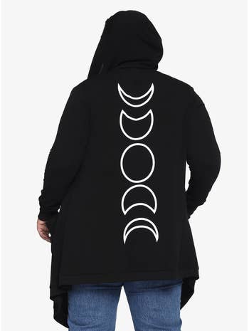 Model wearing moon phases cardigan