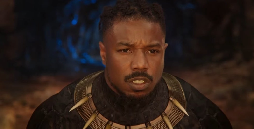 Kilmonger on his knees as he stares at the sunset in Wakanda in &quot;Black Panther&quot;