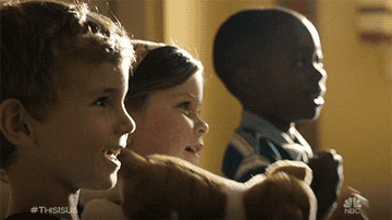 Young Kevin, Kate, and Randall smiling