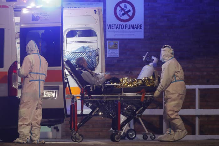 A patient is placed in an ambulance