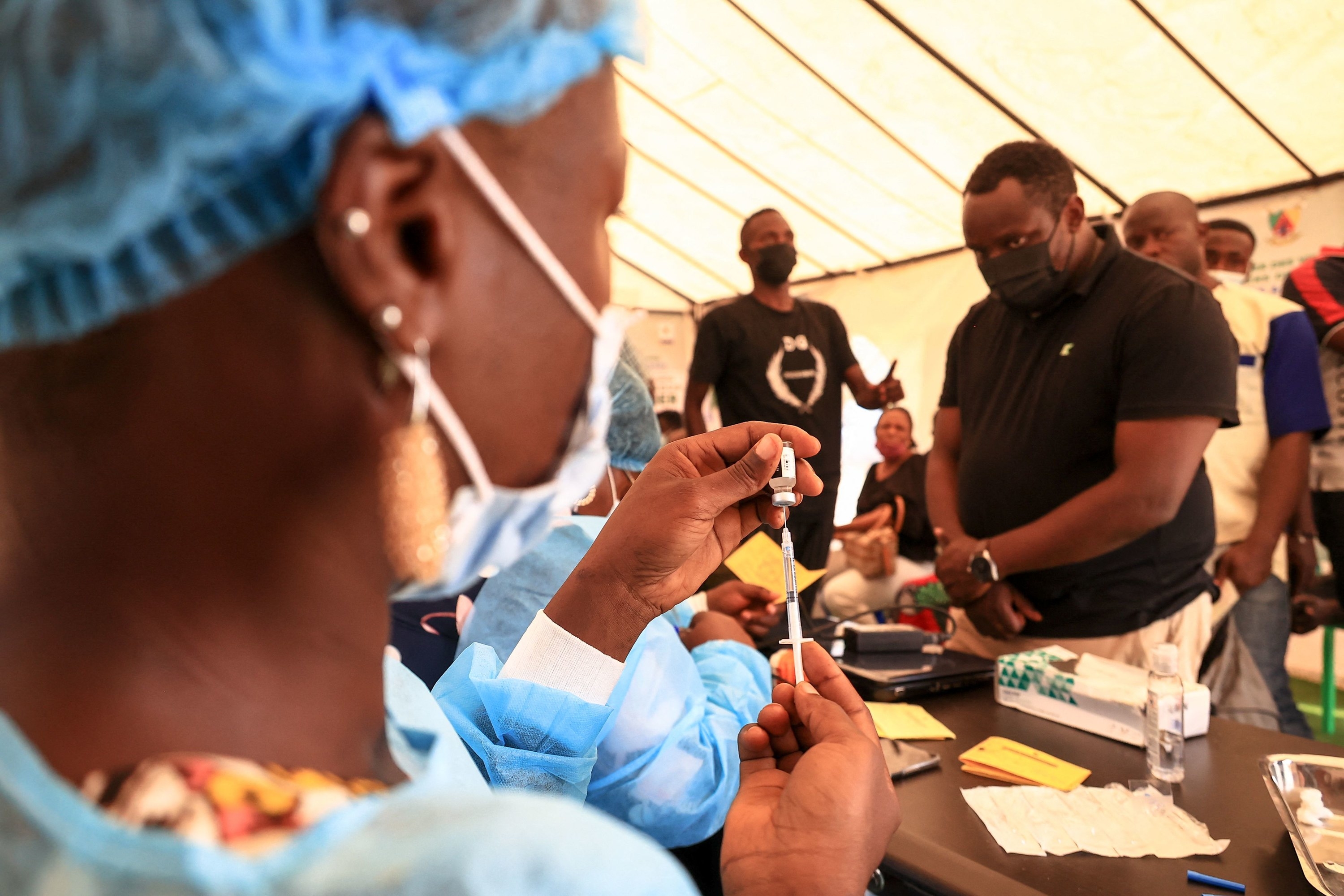 People waiting for their vaccination shots