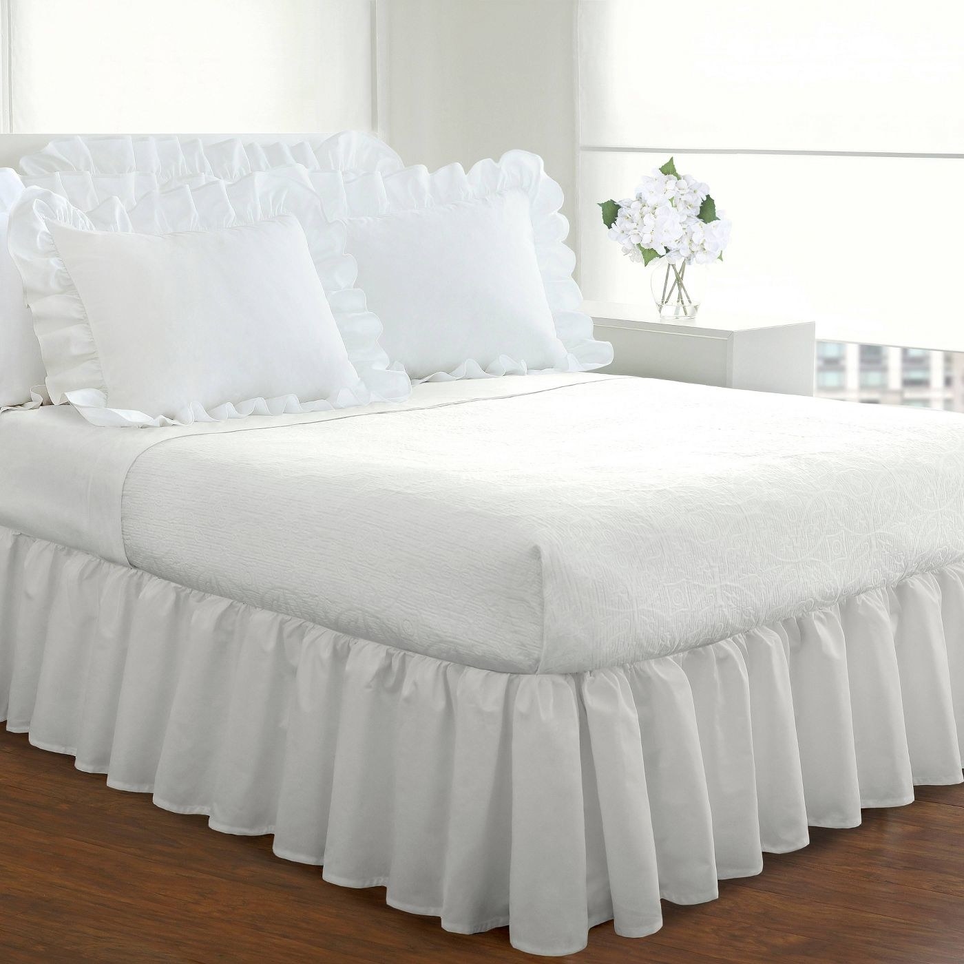 The white bed skirt