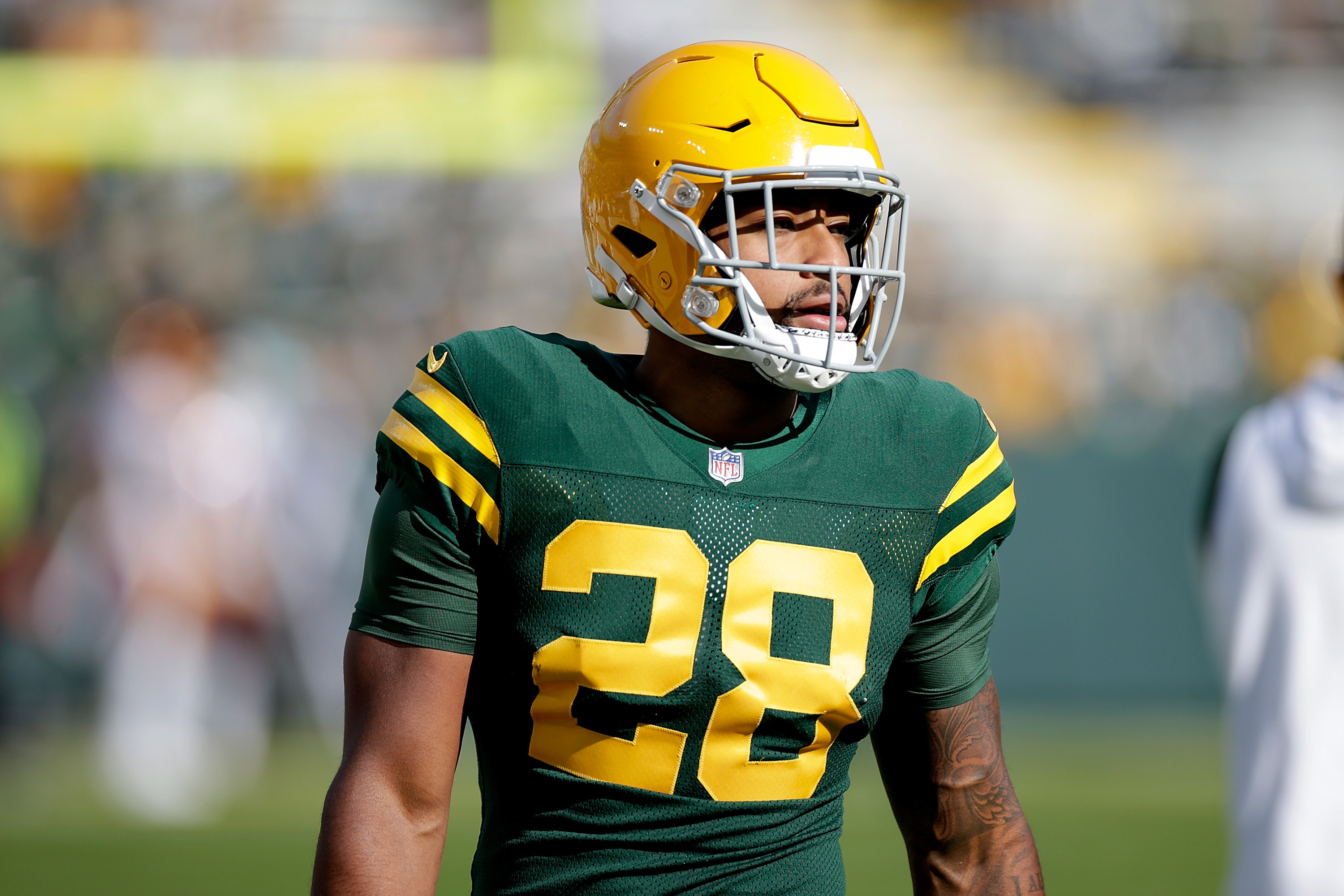 AJ Dillon in a green and yellow Packers uniform