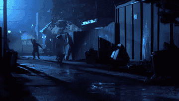 woman running away from Freddy Kreuger