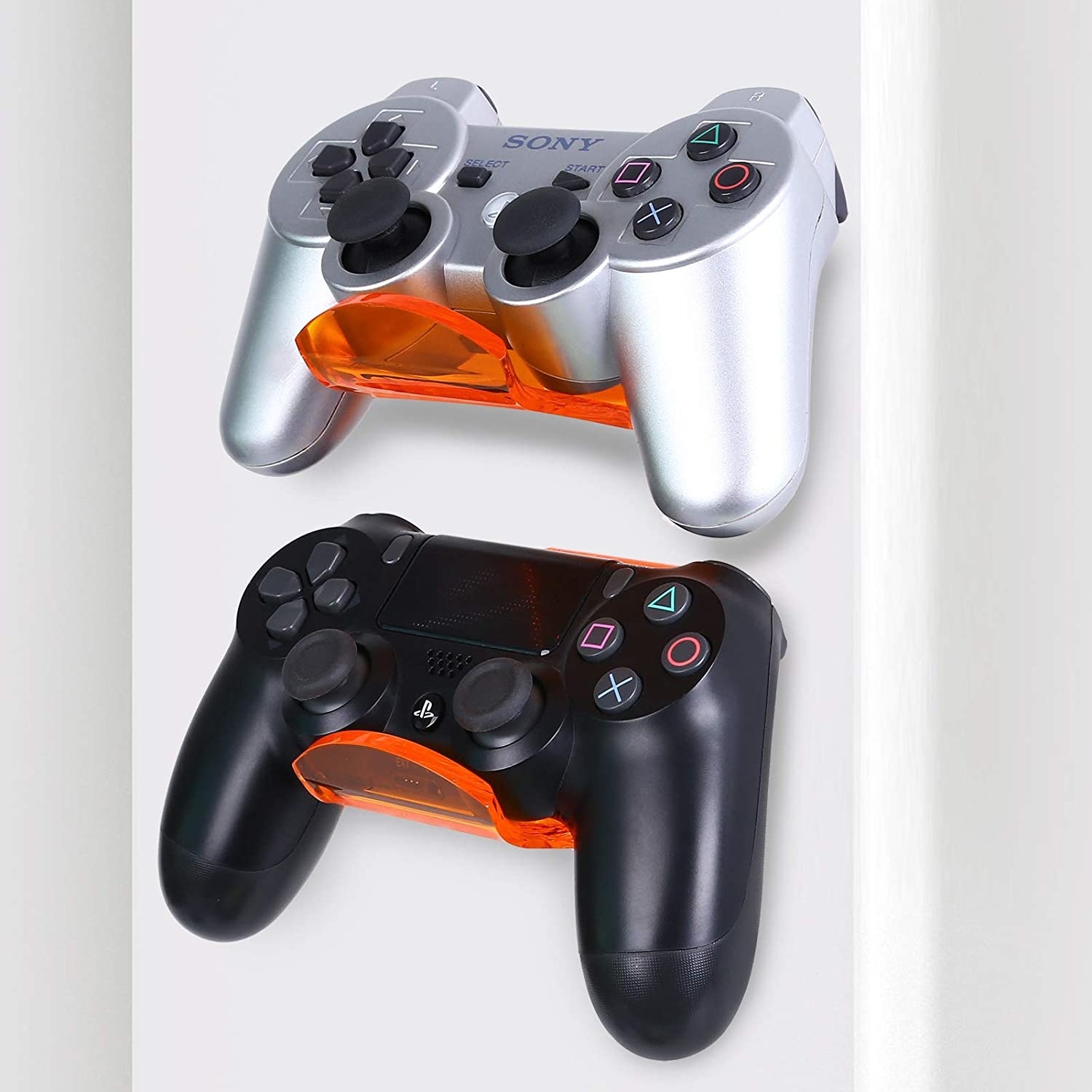 a pair of gaming controllers on the wall mounted stands