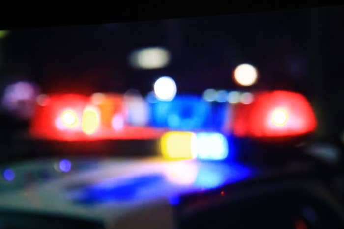 An up-close picture of blurry police car lights