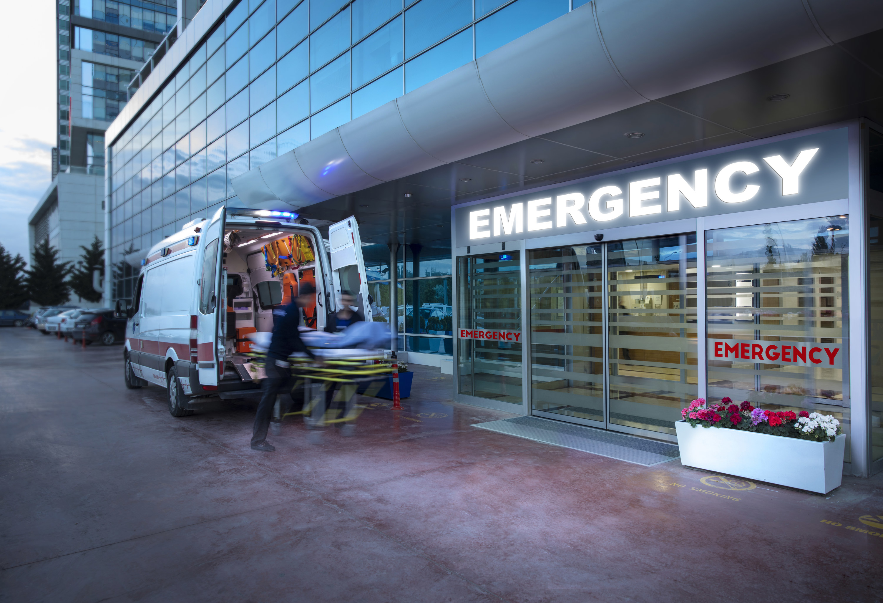 An ambulance outside of a hospital&#x27;s emergency room