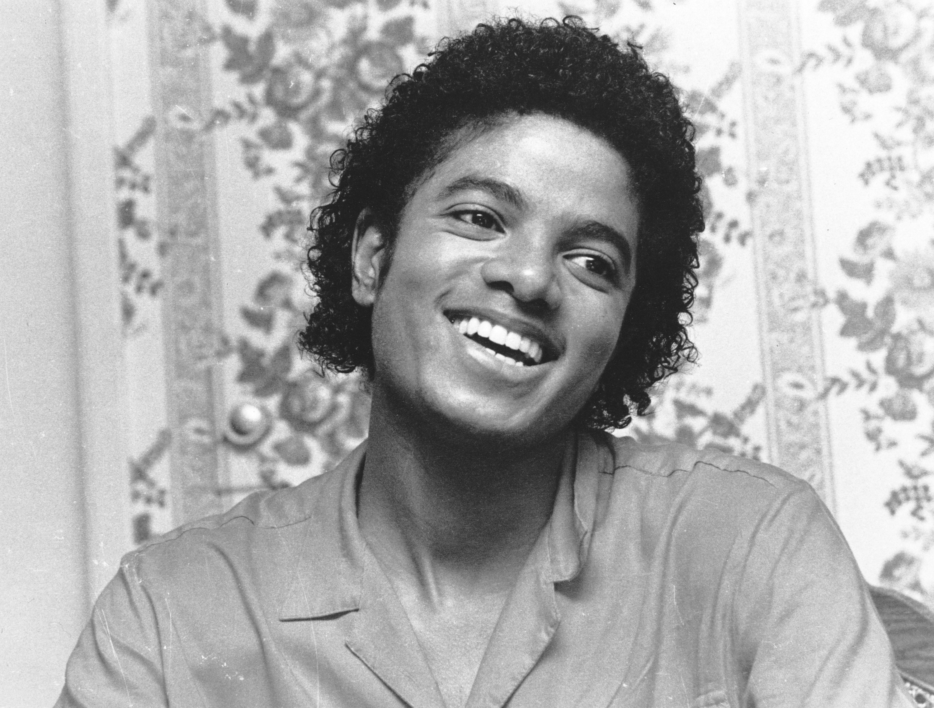 A photo of a smiling Michael Jackson in 1981
