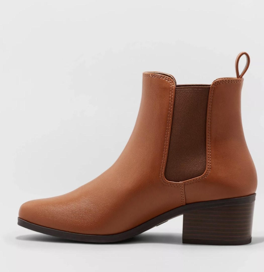 The brown boots have an elastic section and a small loop on the heel
